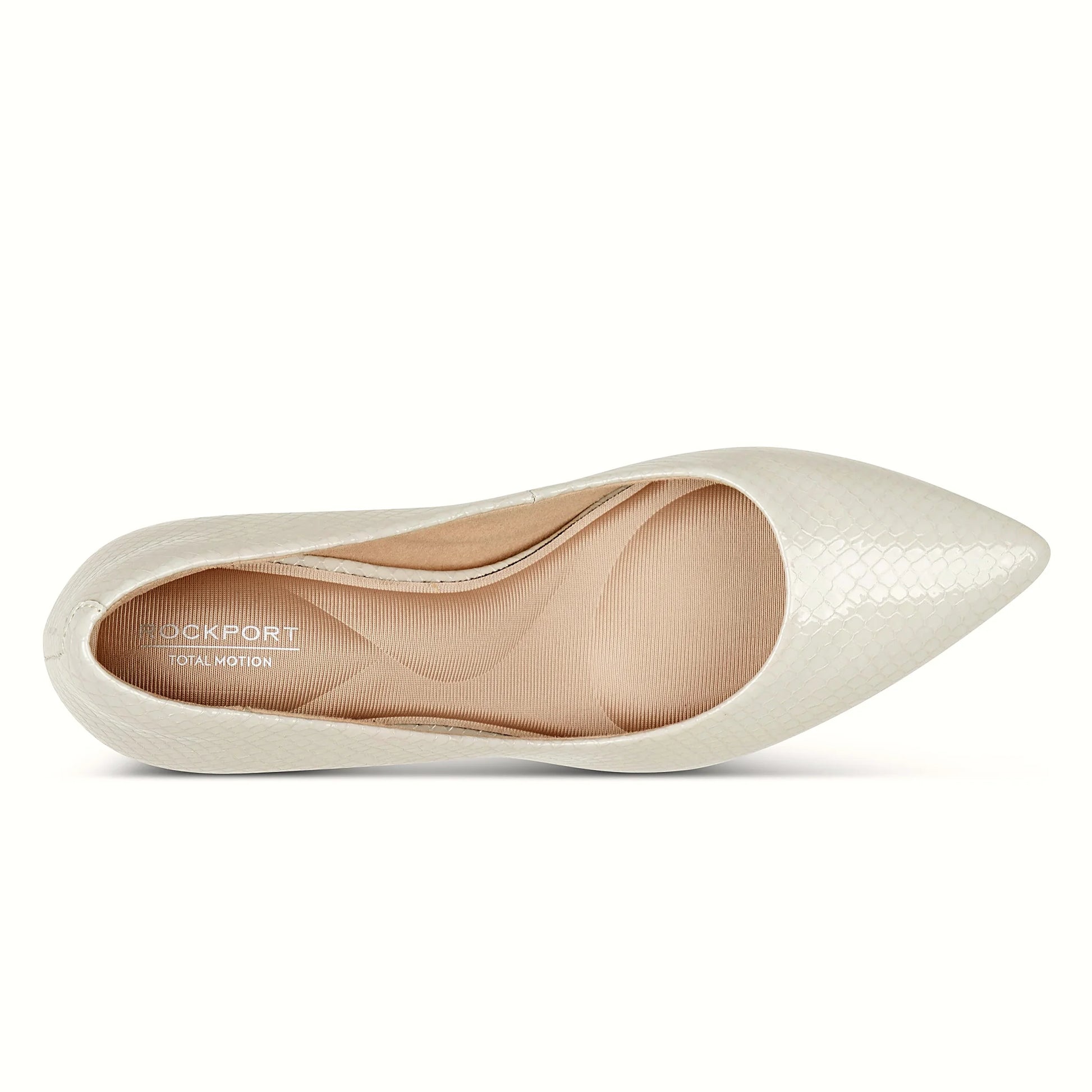 Pair of pointed slip-on pumps photographed from above on a plain background