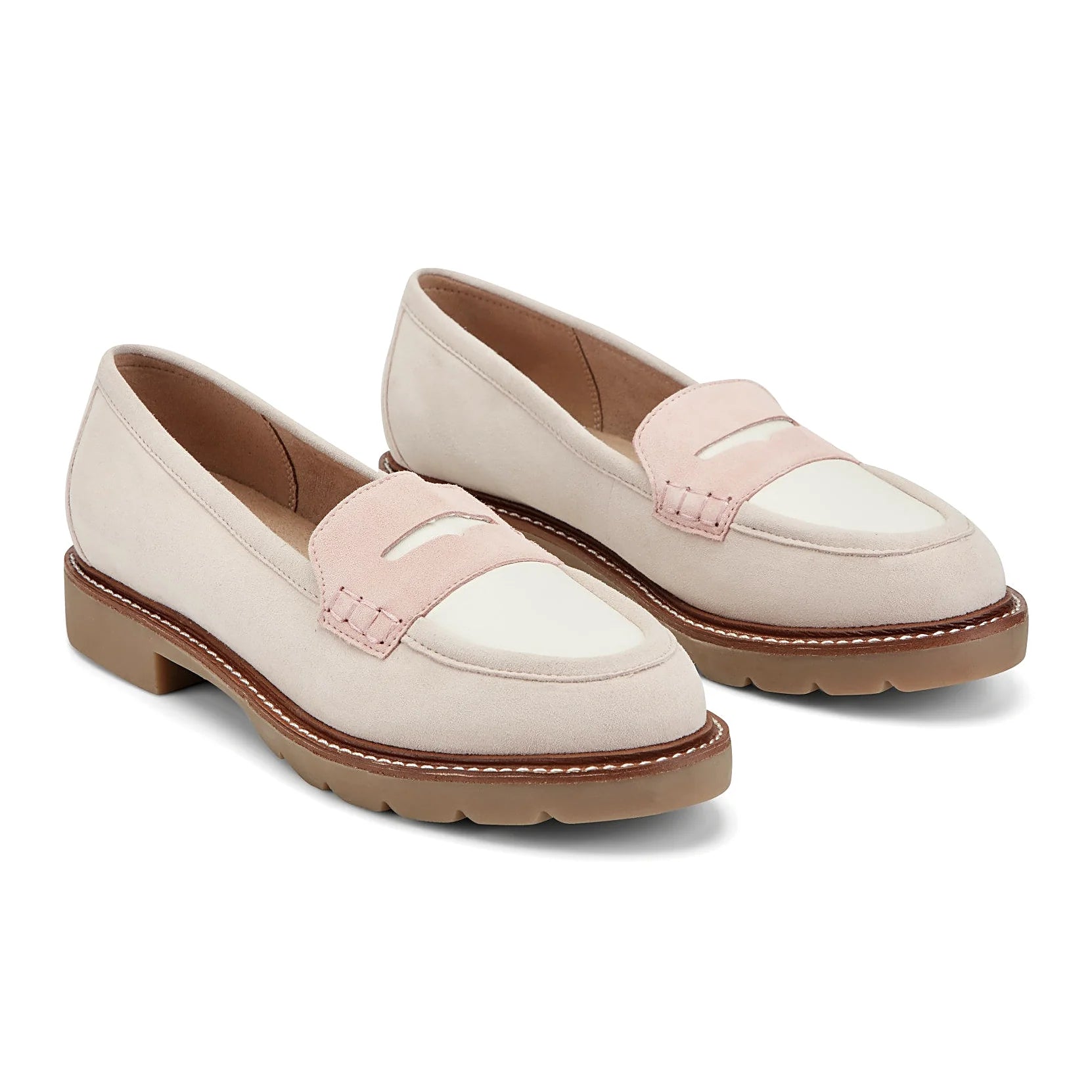 Close view of the hand-finished stitching along the outsole edge of a loafer