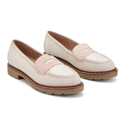 Close view of the hand-finished stitching along the outsole edge of a loafer