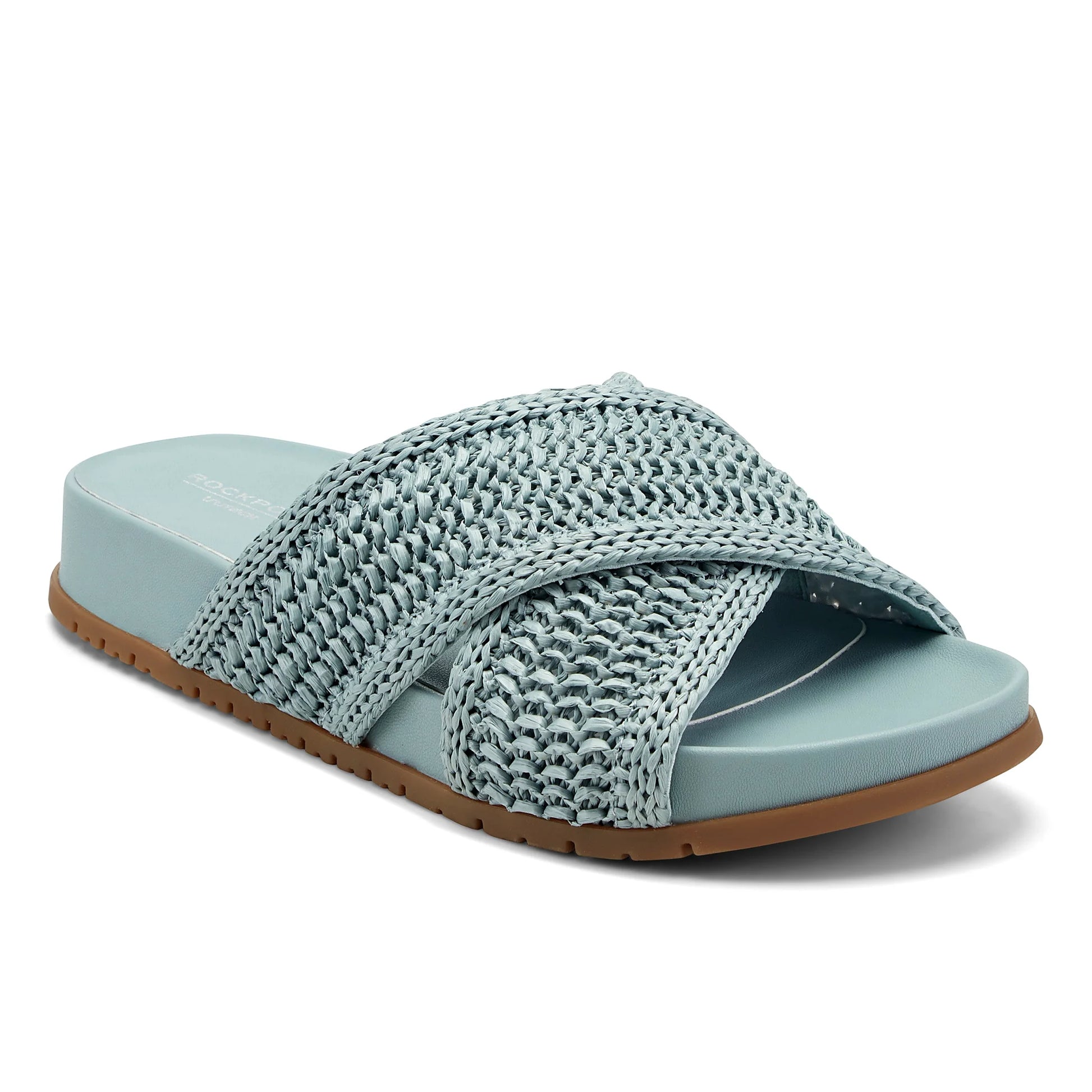 Close view of the wide crossing straps over the forefoot of a sandal