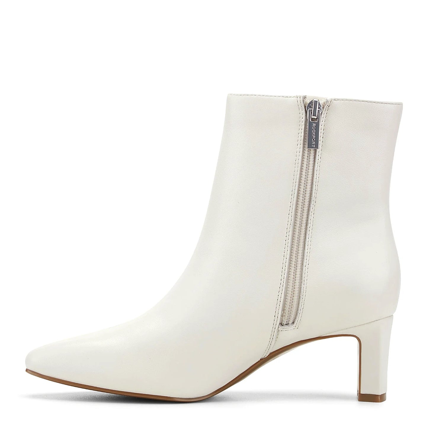 Pair of calf hair dress booties photographed from above on a plain background