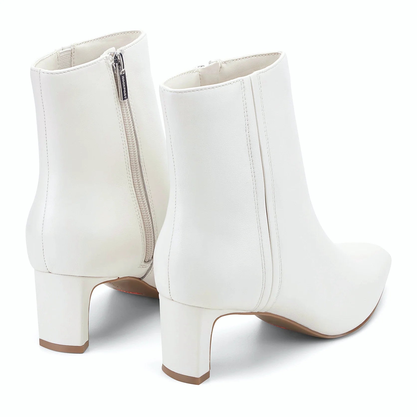 Rear view of a dress bootie showing the moderate heel height