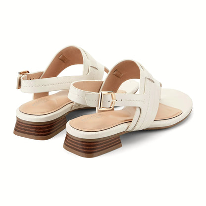 Rear view of a thong sandal showing the gold-tone slingback buckle