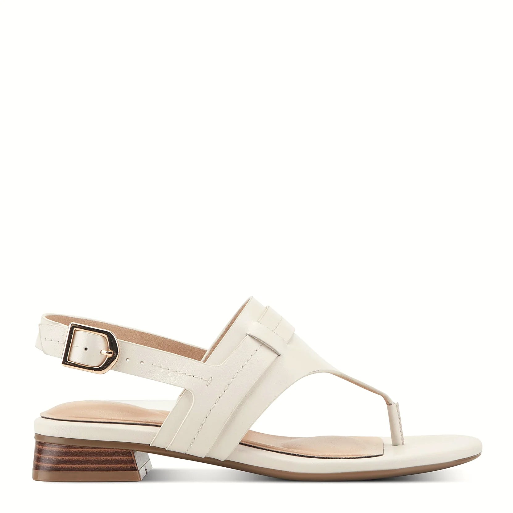 Side view of an ivory leather thong sandal with a low stacked heel