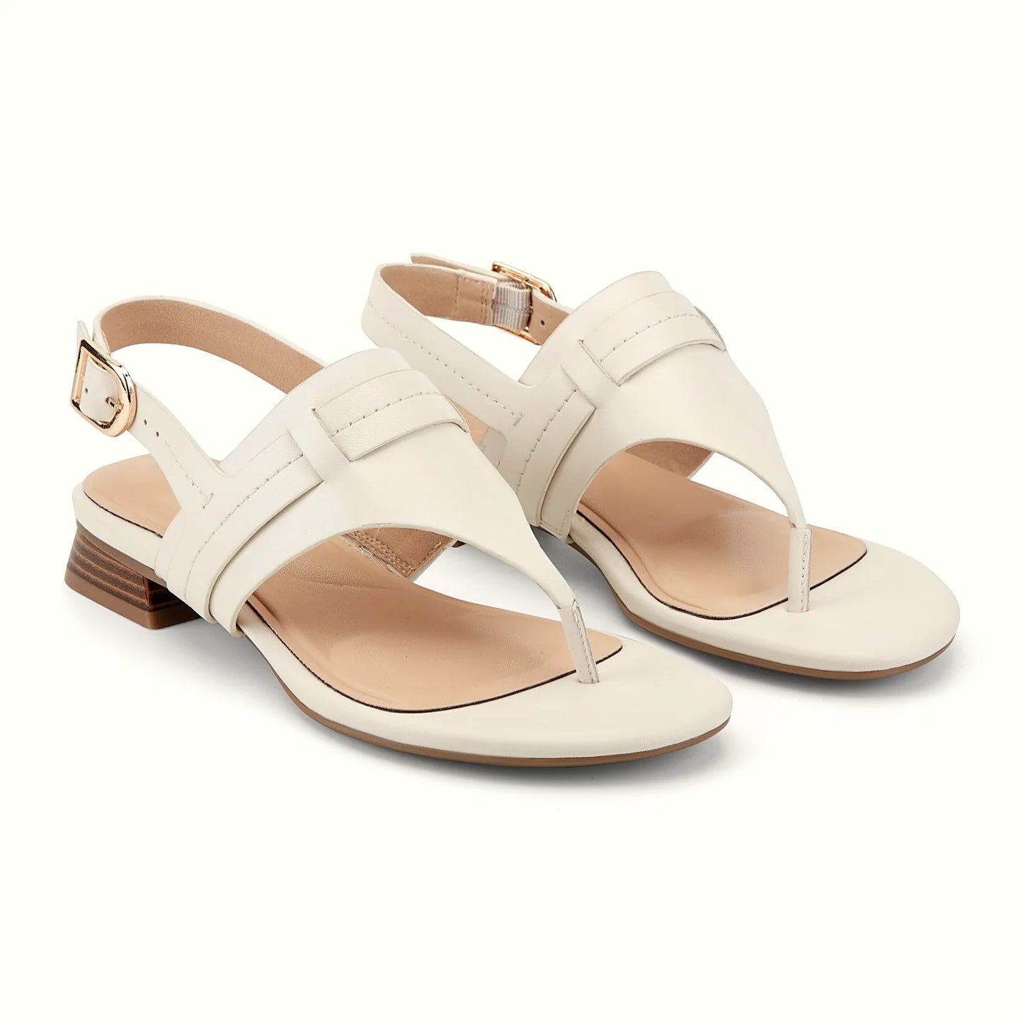 Close view of the sculpted vamp and tonal stitching on a thong sandal