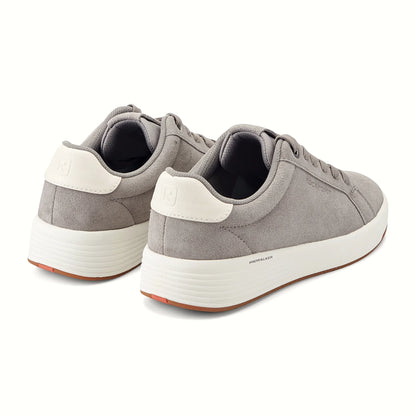 Rear view of a sneaker showing the gum rubber outsole edge