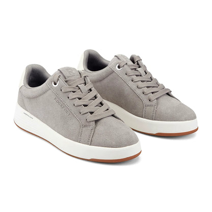 Close view of the contrast heel tab and padded collar on a low sneaker