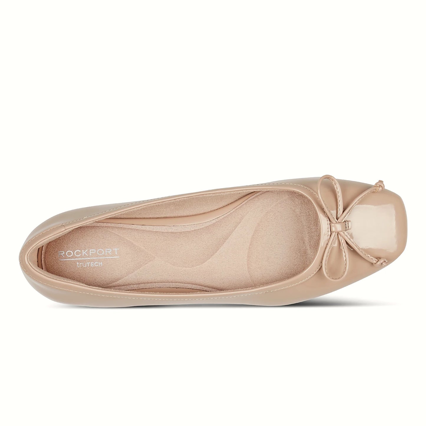 Pair of bow ballet flats photographed from above on a plain background