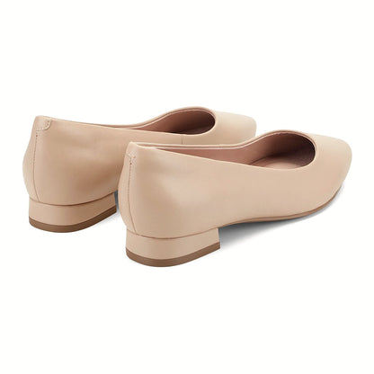 Rear view of a pointed slip-on flat showing the low heel