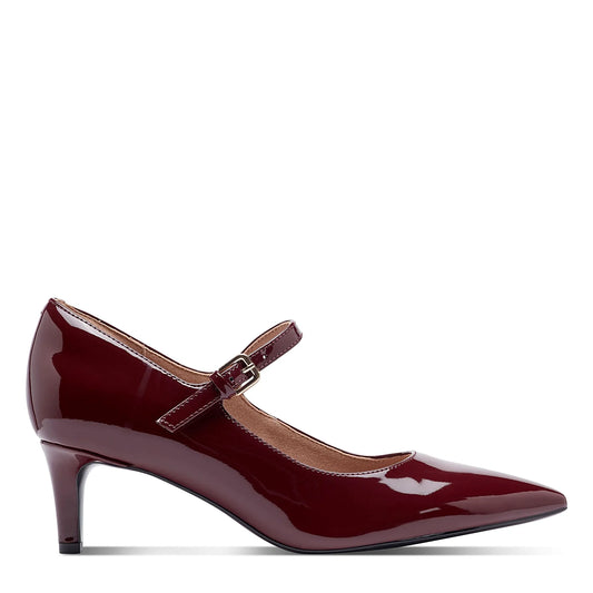 Side view of a dark red patent mary jane pump on a slim stiletto heel