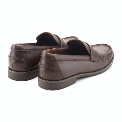 Rear view of a penny loafer showing the stacked heel and rubber outsole