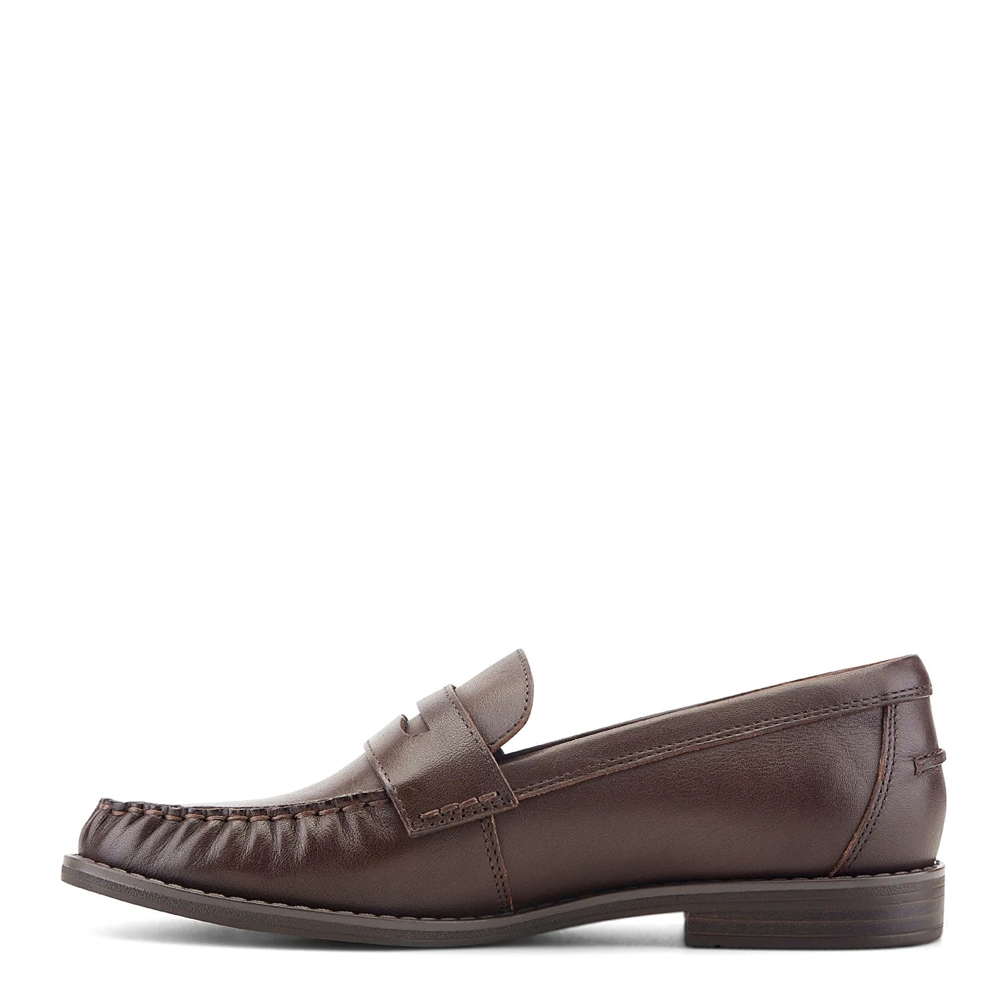 Pair of penny loafers photographed from above on a plain background